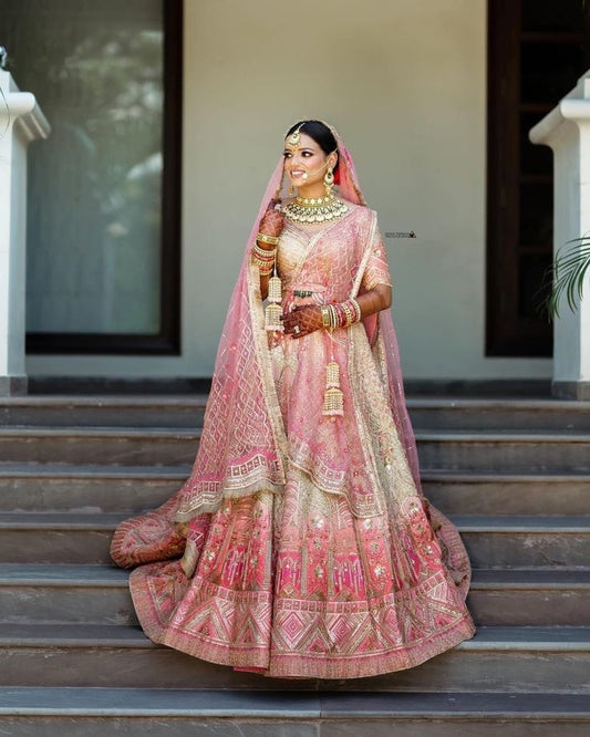 Stunning pink and silver Royal Lehenga for Mehendi ceremony